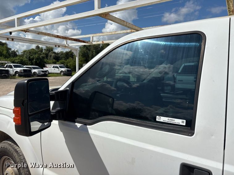 image for item EU0841 2014 Ford F250 Super Duty Crew Cab utility bed pickup truck
