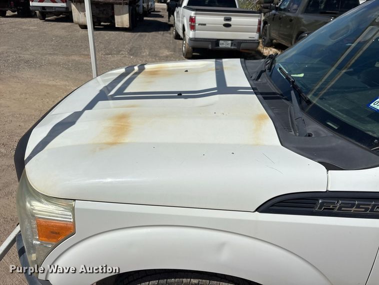 image for item EU0841 2014 Ford F250 Super Duty Crew Cab utility bed pickup truck