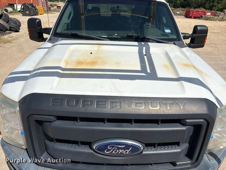 image for item EU0841 2014 Ford F250 Super Duty Crew Cab utility bed pickup truck