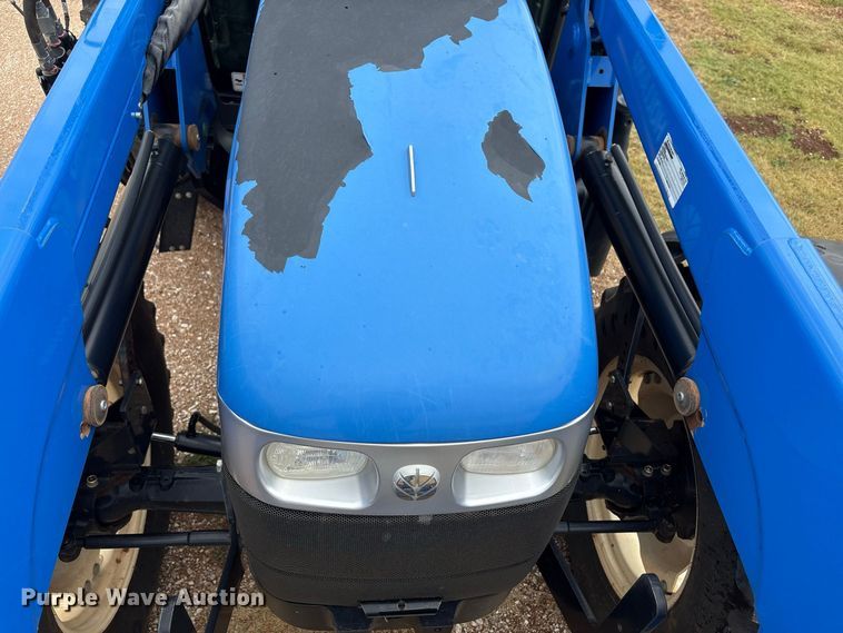 image for item EX0040 New Holland TS6.140 MFWD tractor
