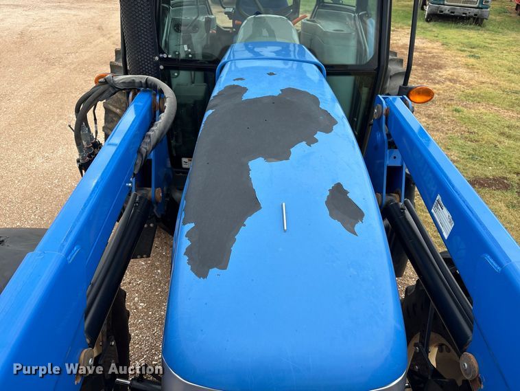 image for item EX0040 New Holland TS6.140 MFWD tractor