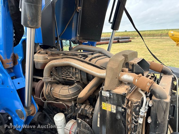 image for item EX0040 New Holland TS6.140 MFWD tractor