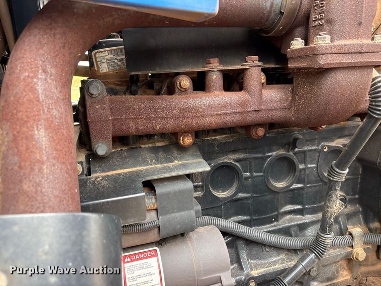 image for item EX0040 New Holland TS6.140 MFWD tractor