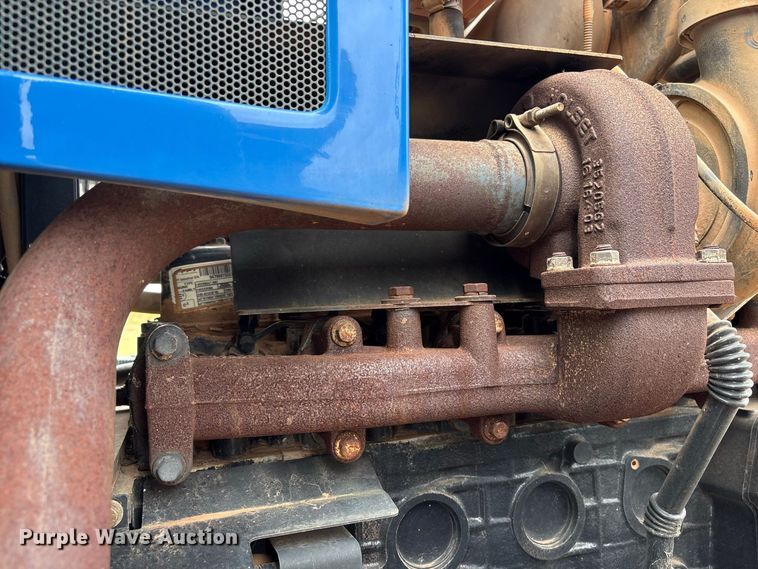 image for item EX0040 New Holland TS6.140 MFWD tractor