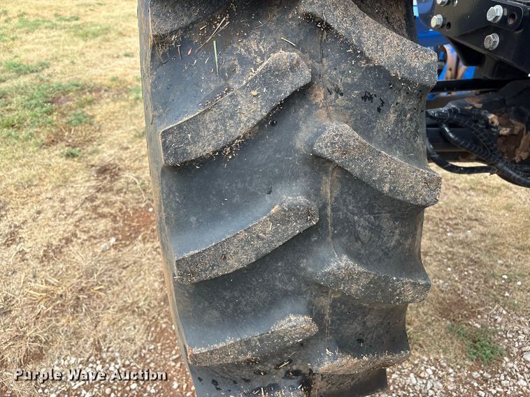 image for item EX0040 New Holland TS6.140 MFWD tractor