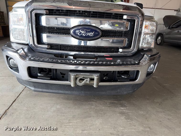 image for item FH6443 2012 Ford F350 Super Duty XLT Crew Cab flatbed pickup truck