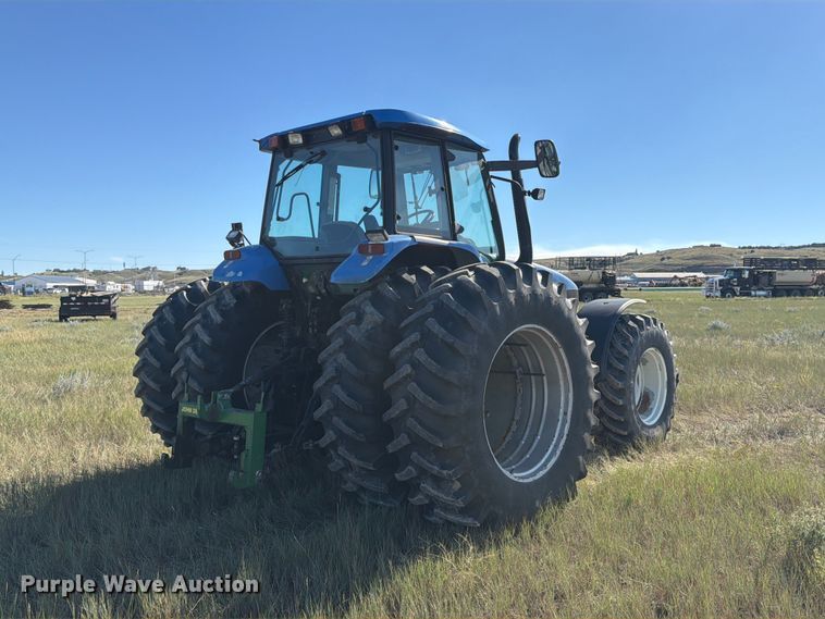 image for item EA0477 2002 New Holland TM130 MFWD tractor