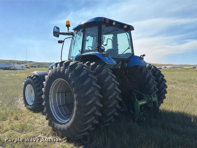 image for item EA0477 2002 New Holland TM130 MFWD tractor