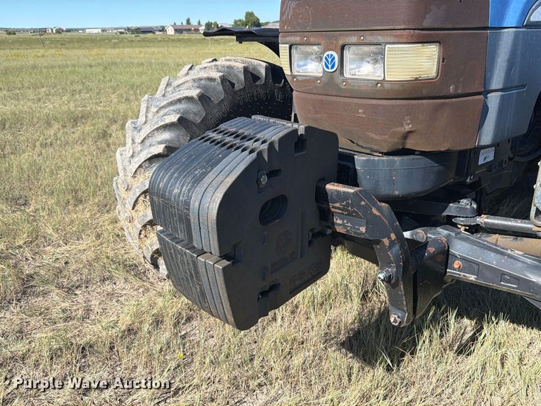 image for item EA0477 2002 New Holland TM130 MFWD tractor