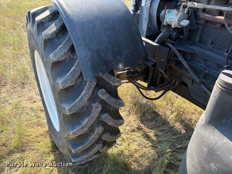 image for item EA0477 2002 New Holland TM130 MFWD tractor