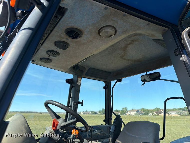 image for item EA0477 2002 New Holland TM130 MFWD tractor