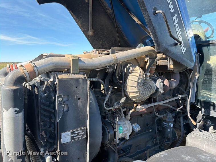 image for item EA0477 2002 New Holland TM130 MFWD tractor