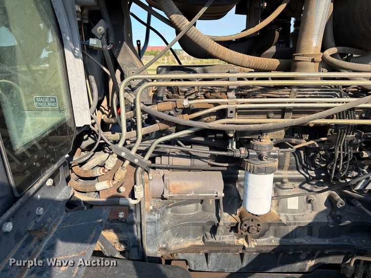 image for item EA0477 2002 New Holland TM130 MFWD tractor