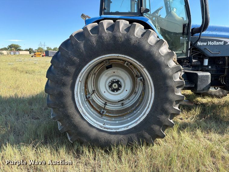 image for item EA0477 2002 New Holland TM130 MFWD tractor