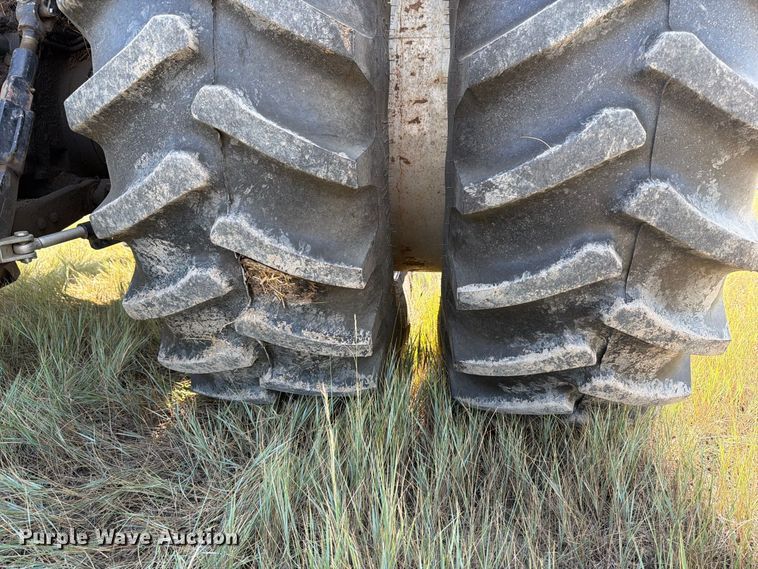 image for item EA0477 2002 New Holland TM130 MFWD tractor