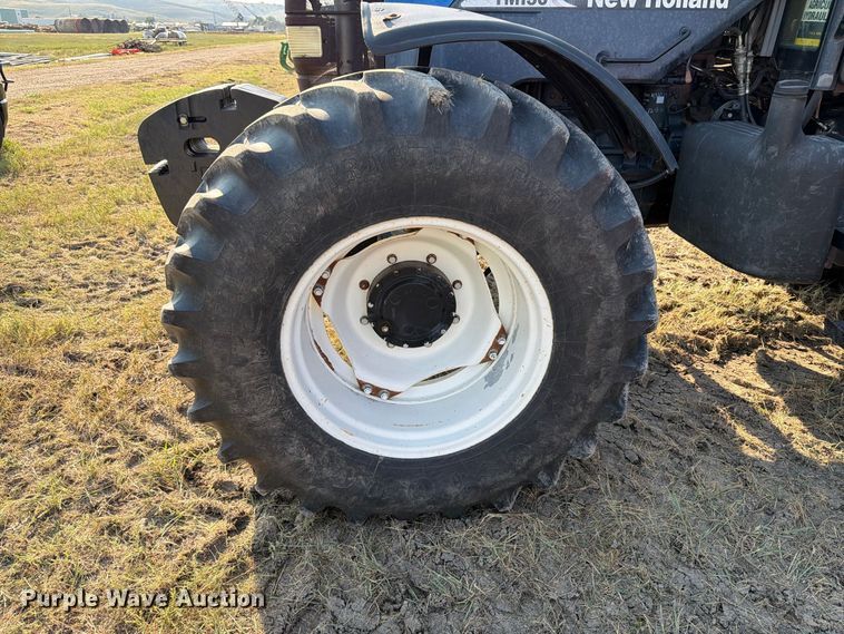 image for item EA0477 2002 New Holland TM130 MFWD tractor