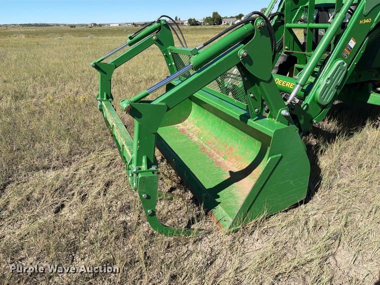 image for item EA0480 2013 John Deere 6125M MFWD tractor