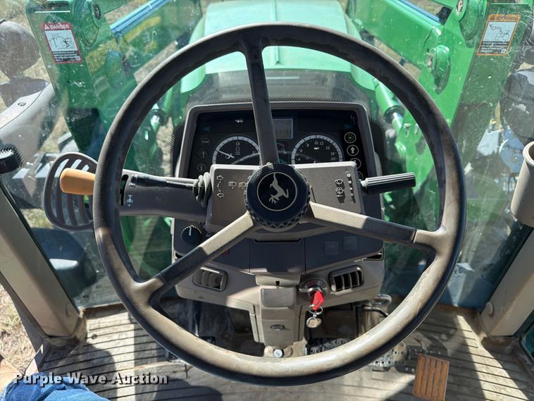image for item EA0480 2013 John Deere 6125M MFWD tractor