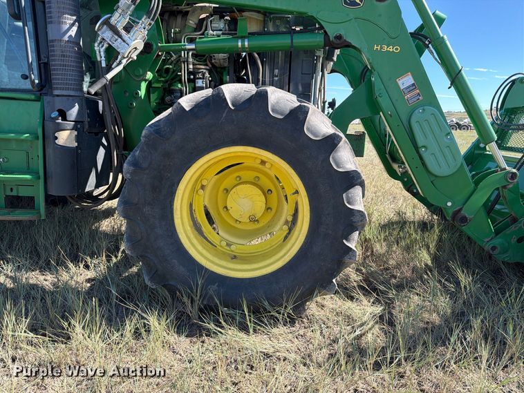 image for item EA0480 2013 John Deere 6125M MFWD tractor