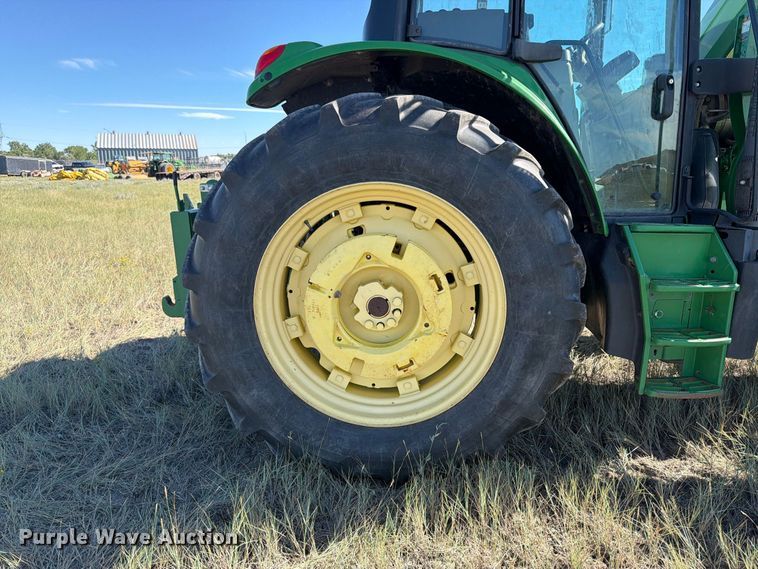image for item EA0480 2013 John Deere 6125M MFWD tractor