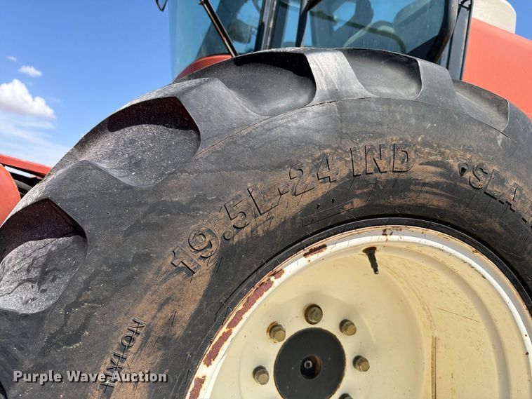 image for item EW8895 1999 Hesston 8450 swather / windrower
