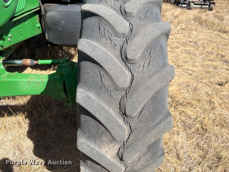 image for item FM7654 2011 John Deere 6330 MFWD tractor