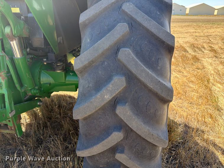 image for item FM7654 2011 John Deere 6330 MFWD tractor