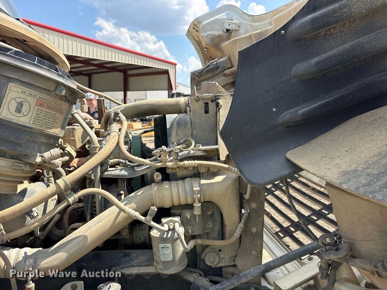 image for item ES8103 2012 Freightliner Business Class M2 rollback truck