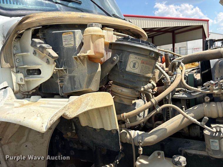 image for item ES8103 2012 Freightliner Business Class M2 rollback truck