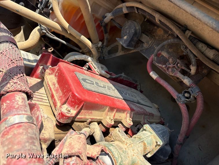 image for item ES8103 2012 Freightliner Business Class M2 rollback truck