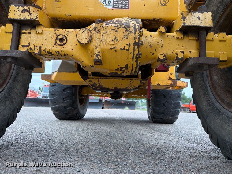 image for item DY3313 2003 John Deere 304H wheel loader