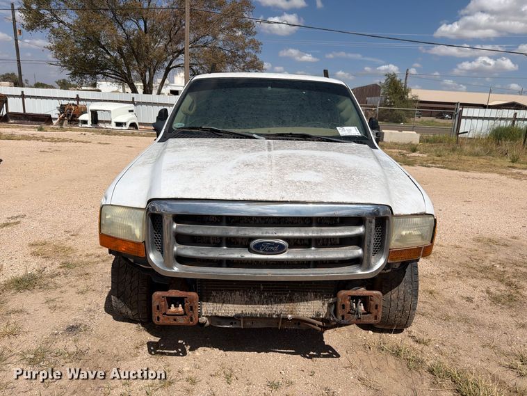 image for item DV8668 2001 Ford F250 Super Duty Ext. Cab flatbed pickup truck