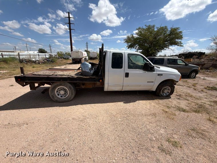 image for item DV8668 2001 Ford F250 Super Duty Ext. Cab flatbed pickup truck