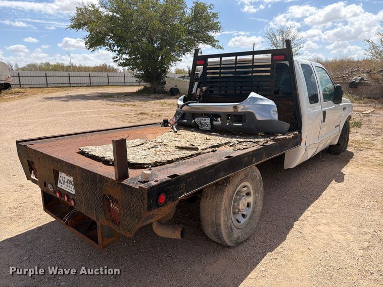 image for item DV8668 2001 Ford F250 Super Duty Ext. Cab flatbed pickup truck