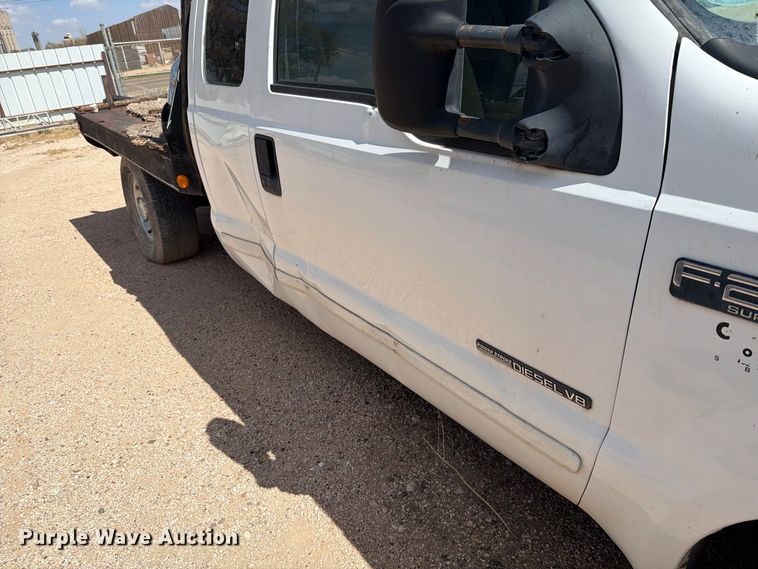 image for item DV8668 2001 Ford F250 Super Duty Ext. Cab flatbed pickup truck