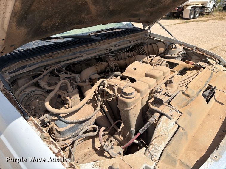 image for item DV8668 2001 Ford F250 Super Duty Ext. Cab flatbed pickup truck