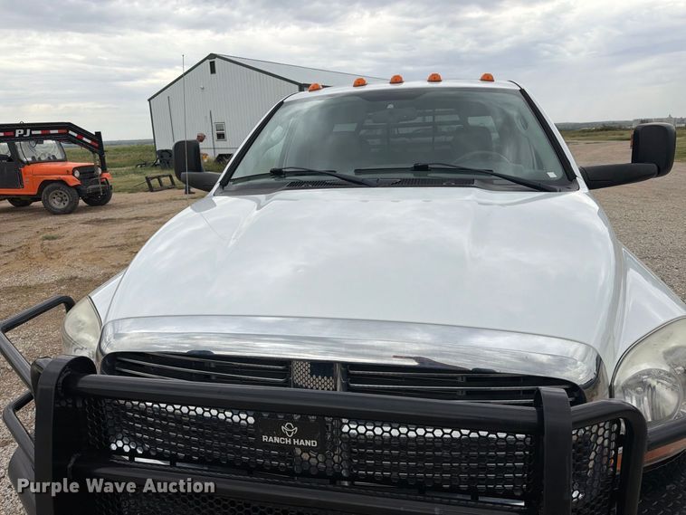 image for item DY3423 2006 Dodge 3500 Ext. Cab bale bed pickup truck