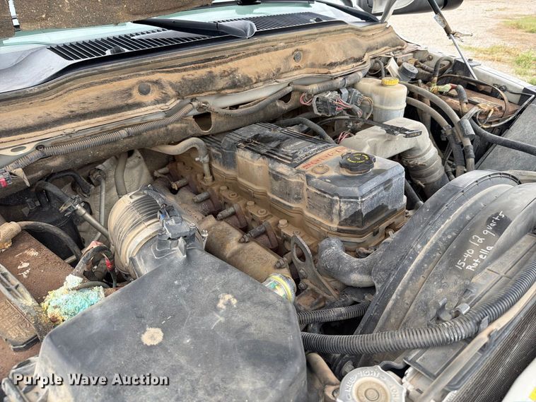 image for item DY3423 2006 Dodge 3500 Ext. Cab bale bed pickup truck