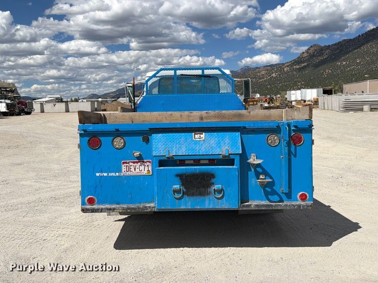 image for item ED0197 2000 International 4700 flatbed truck