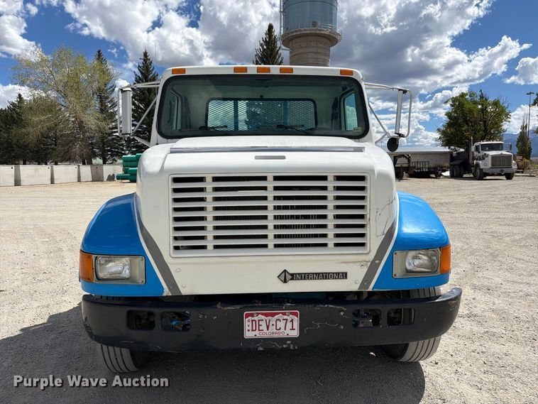 image for item ED0197 2000 International 4700 flatbed truck