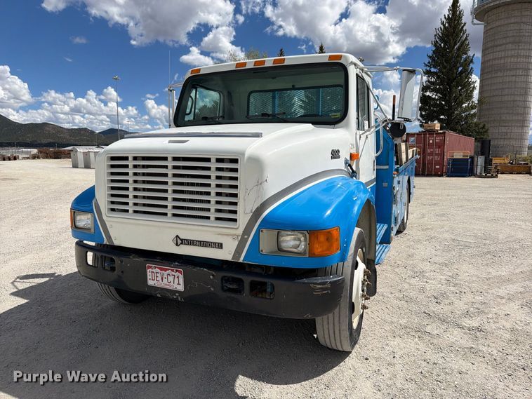 image for item ED0197 2000 International 4700 flatbed truck