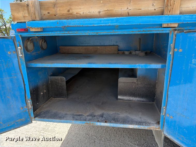 image for item ED0197 2000 International 4700 flatbed truck