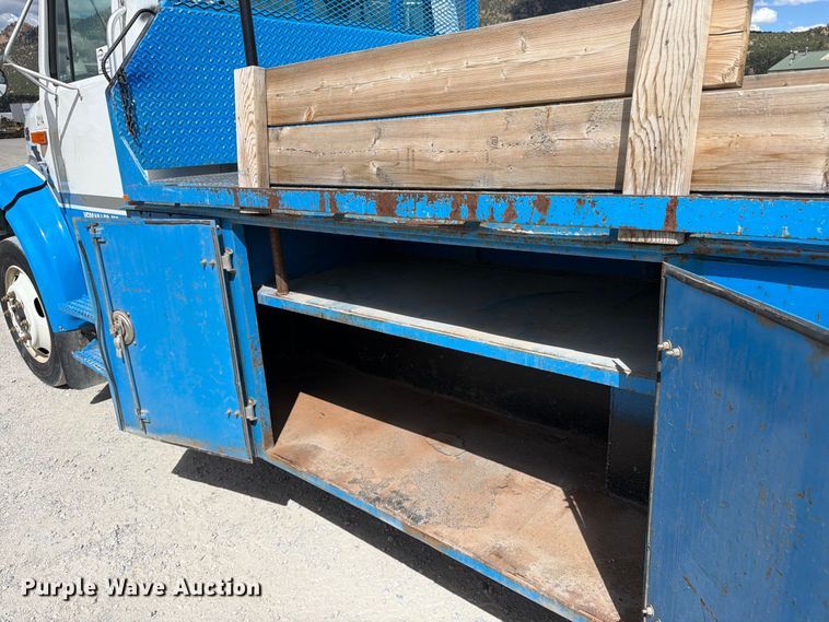 image for item ED0197 2000 International 4700 flatbed truck