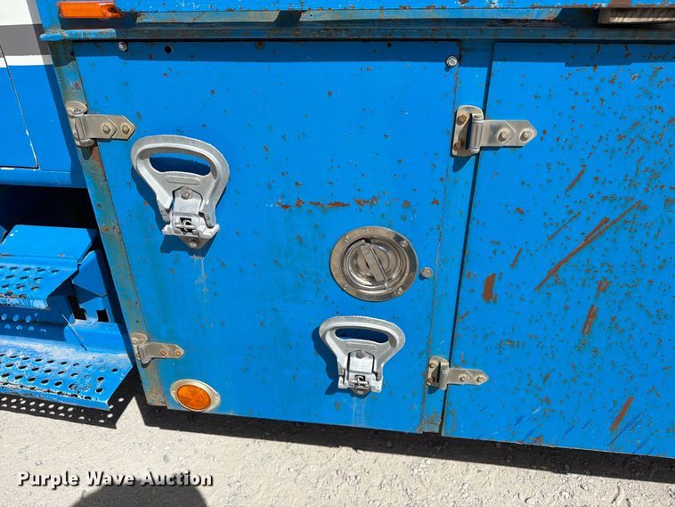 image for item ED0197 2000 International 4700 flatbed truck