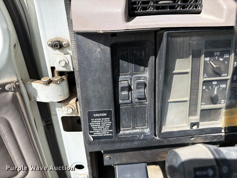 image for item ED0197 2000 International 4700 flatbed truck