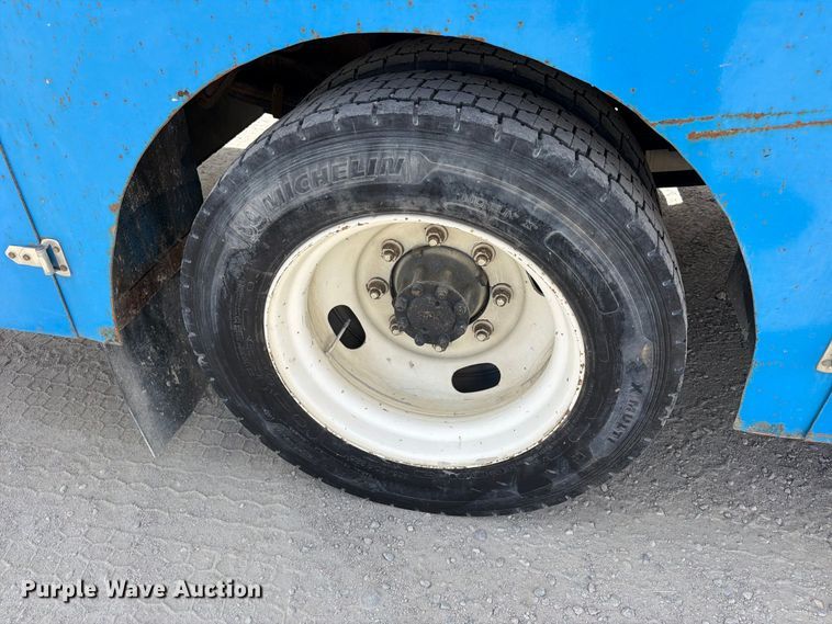 image for item ED0197 2000 International 4700 flatbed truck