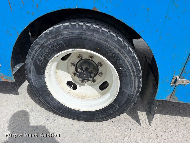 image for item ED0197 2000 International 4700 flatbed truck