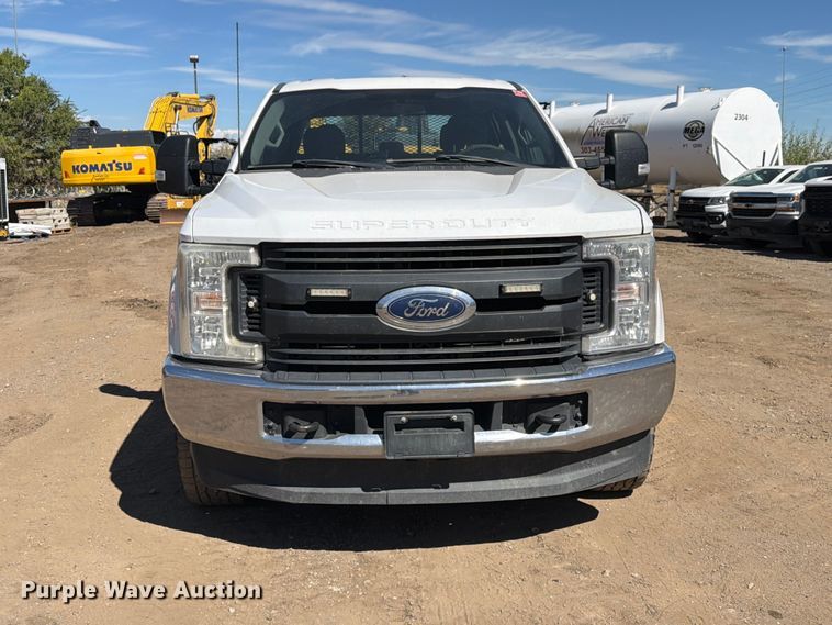 image for item ED0199 2017 Ford F350 Super Duty Crew Cab utility bed pickup truck