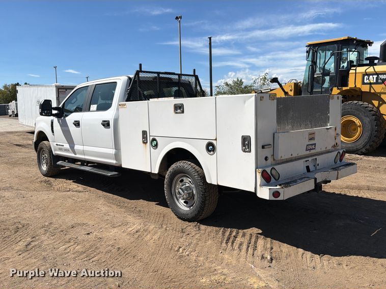 image for item ED0199 2017 Ford F350 Super Duty Crew Cab utility bed pickup truck