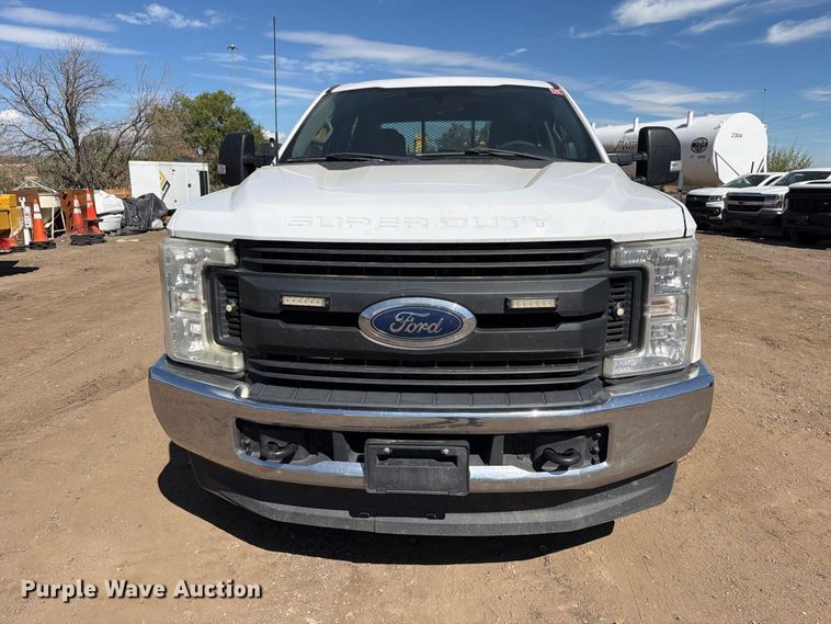 image for item ED0199 2017 Ford F350 Super Duty Crew Cab utility bed pickup truck